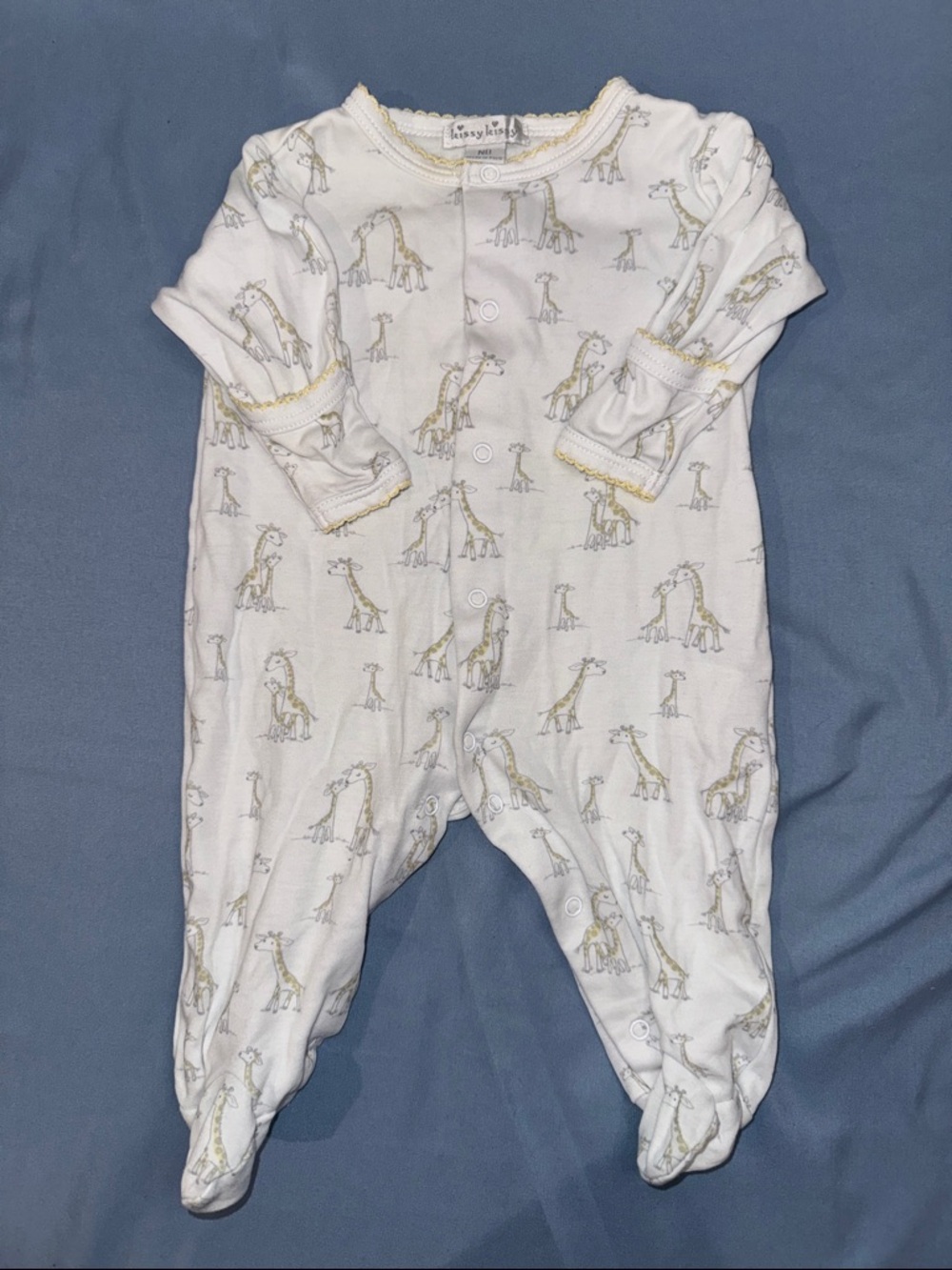 Kissy Kissy Cream Footed One-Piece with Yellow Giraffe Print
